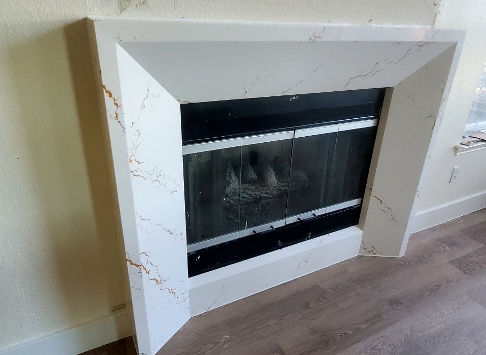 Cambria bevel fireplace surround Inverness Gold.